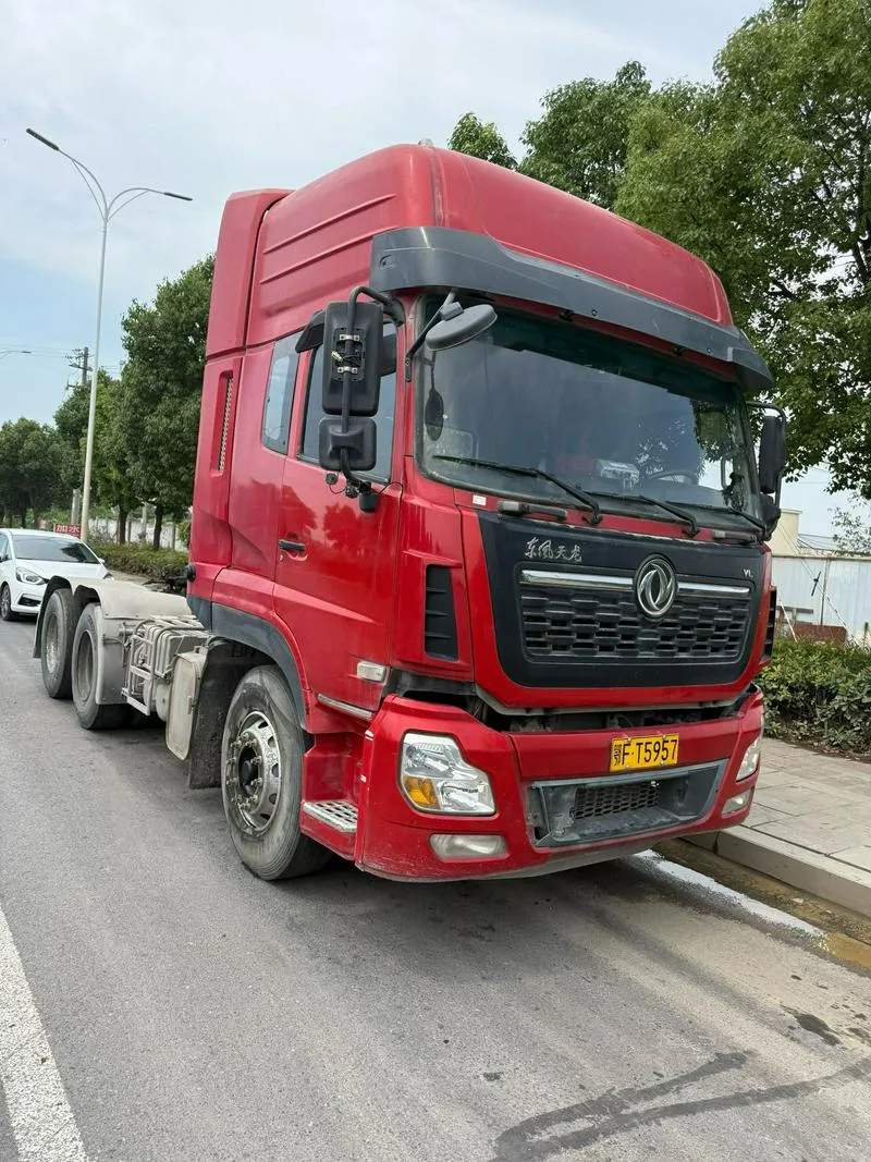 21年东风天龙牵引车，450马力，实表30公里左右，包提户4万人民币，可代办中亚五国落户费用另计